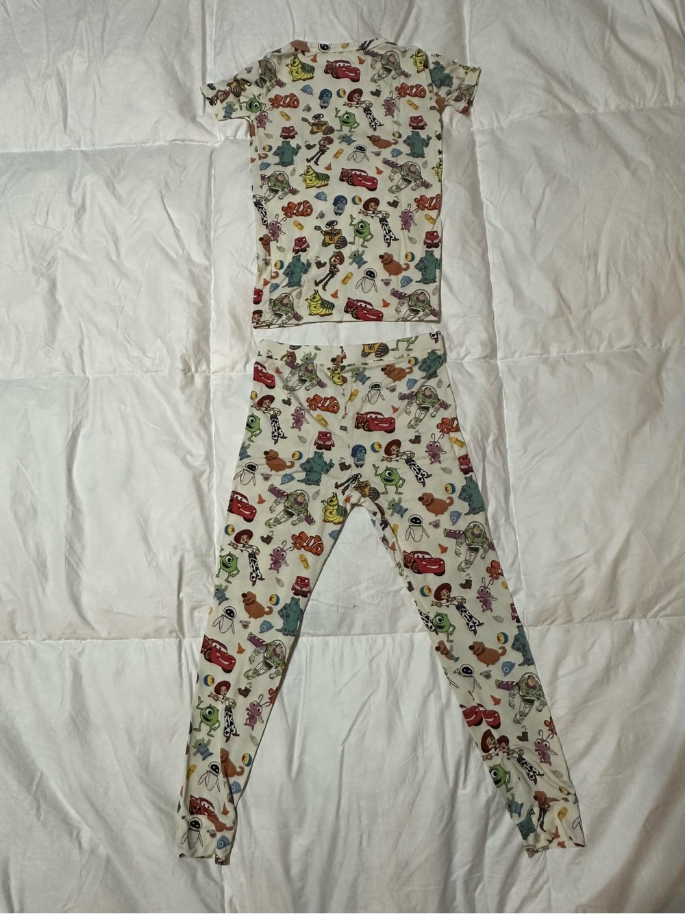 Little Sleepies Cream Pajama Set with Multicolor Toy Print
